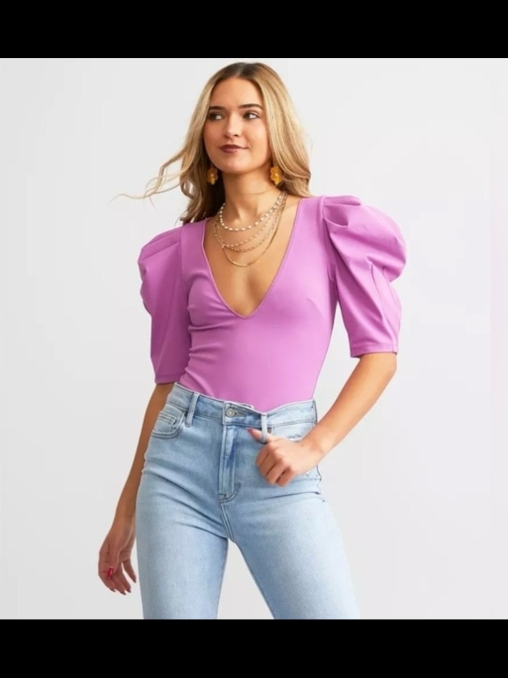 Puff-Sleeve V-Neck Bodysuit in Bright Lavender.  Intimately Free People